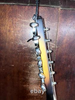 Guitare jumbo à 12 cordes en érable avec table massive et préampli Guild F-2512E Deluxe